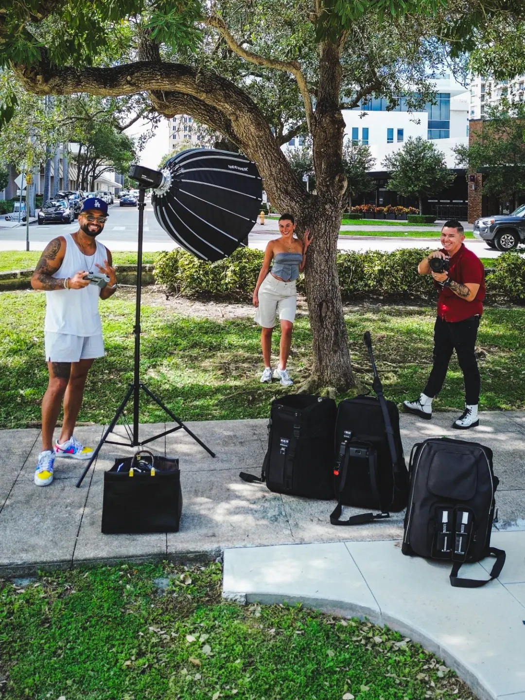 Lovos crew shooting outdoors under a tree in Miami